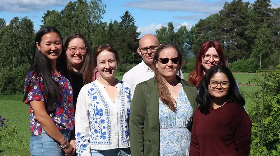 Group photo of Haapaniemi Lab members attending the retreat, facing the camera and smiling.