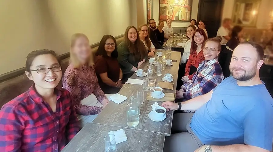 Haapaniemi Group members sitting around a restaurant table at Pavel and Oddrun's farewell dinner