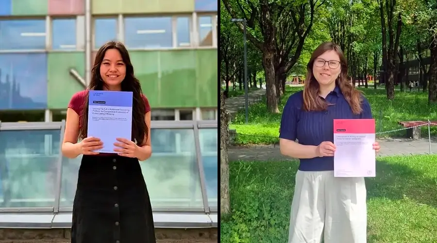 Renate and Nora holding their Master theses