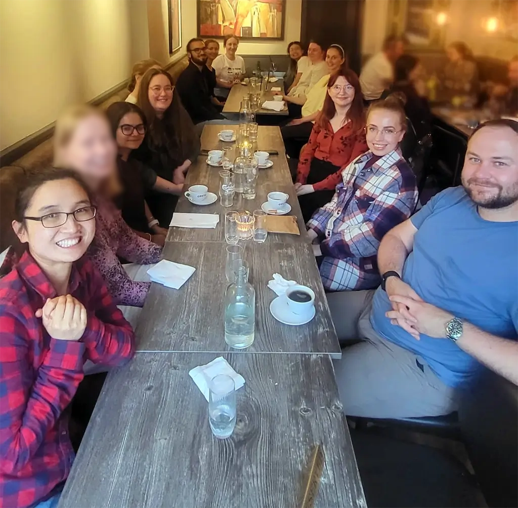 Haapaniemi Group members sitting around a restaurant table at Pavel and Oddrun's farewell dinner