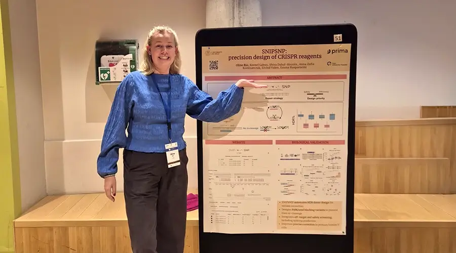 Oline presenting her poster at the 2026 EMBL Partnership Meeting.